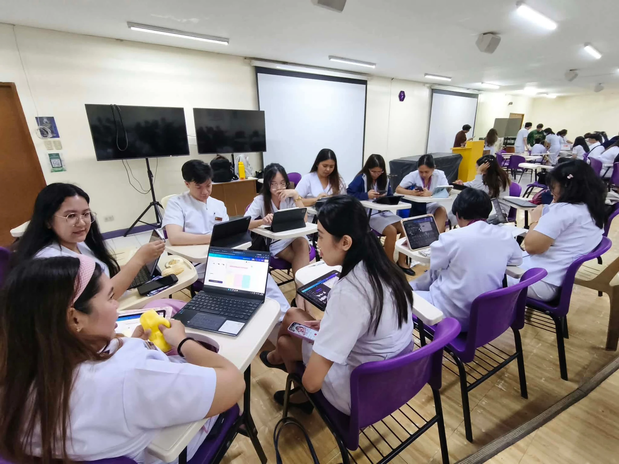 JJ and classmates during their G6PD group activity and reporting